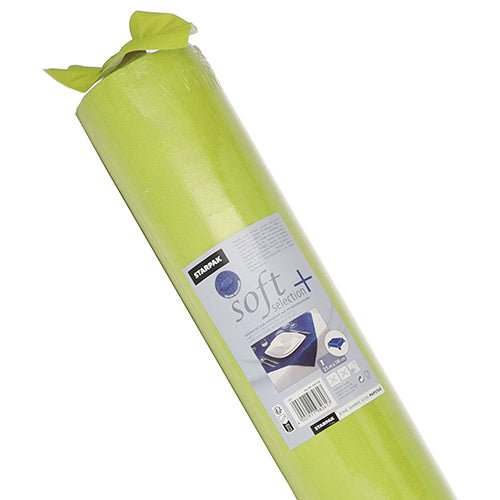 A partially unpacked roll of light green, fabric-like Starpak tablecloth "soft selection plus"; the label shows text and images with this durable fleece cover from Starpak in use on a table.