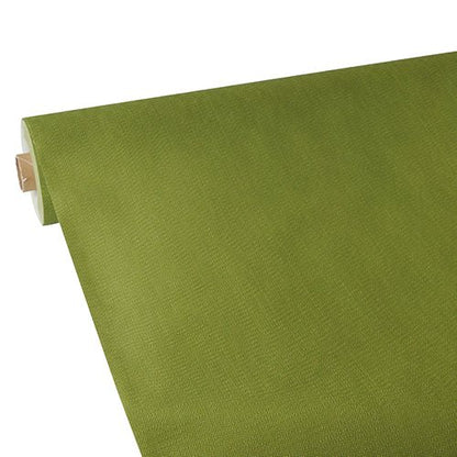 A roll of green Starpak tablecloth, fabric-like, fleece "soft selection plus" lies unrolled on a flat surface, with the cardboard core partially visible. The Starpak fabric appears smooth with a slight texture.