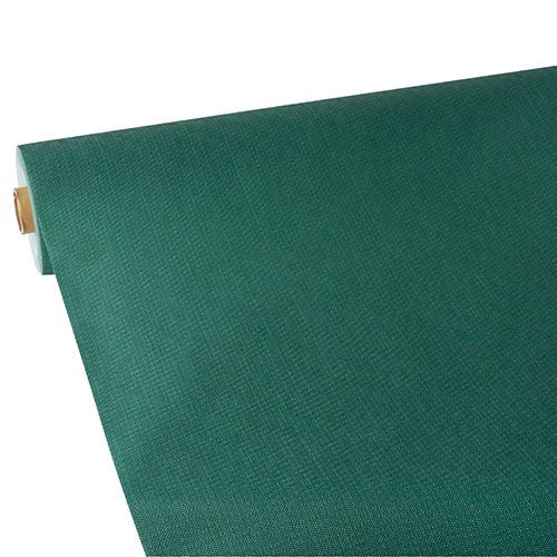 A roll of Starpak tablecloth, fabric-like, fleece "soft selection plus" in green is partially unrolled on a flat surface, with the textured, fabric-like surface and cardboard sleeve visible at one end.