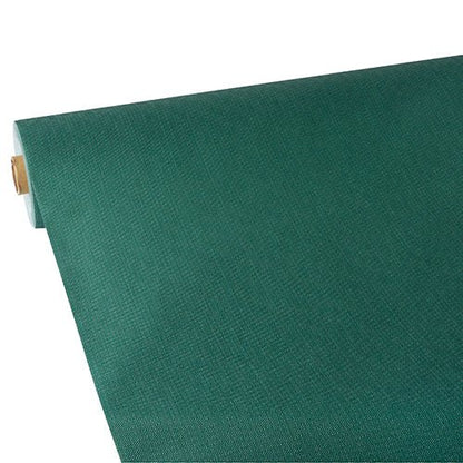 A roll of Starpak tablecloth, fabric-like, fleece "soft selection plus" in green is partially unrolled on a flat surface, with the textured, fabric-like surface and cardboard sleeve visible at one end.