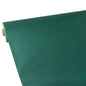 A roll of Starpak tablecloth, fabric-like, fleece "soft selection plus" in green is partially unrolled on a flat surface, with the textured, fabric-like surface and cardboard sleeve visible at one end.