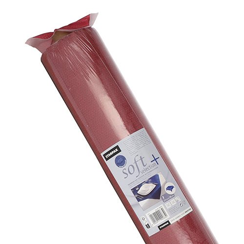 A roll of Starpak tablecloth, fabric-like, fleece "soft selection plus" comes in plastic packaging with product information and images showing its stylish, durable use - similar to a fabric tablecloth for disposable use.