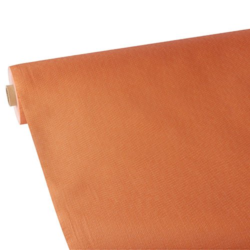 A partially unrolled Starpak tablecloth, fabric-like, fleece "soft selection plus" in plain orange is displayed against a white background, with the fabric-like texture subtly visible.