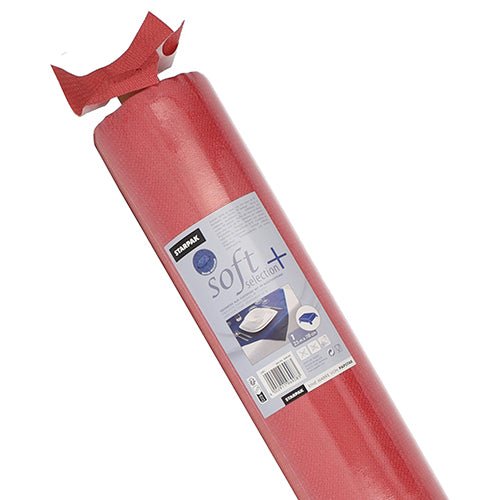 A red roll of "Starpak tablecloth, fabric-like, fleece soft selection plus" in plastic packaging shows product details and usage under a carpet; ideal as a durable tablecloth or stabilization layer for the fabric-like tablecloth from Starpak.