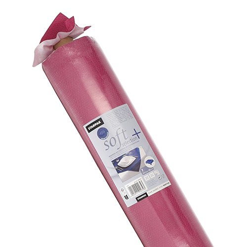 A roll of Starpak tablecloth, fabric-like, fleece "soft selection plus" pink cleaning cloths in a plastic packaging with a label containing product details and an illustration of the tablecloth in use.