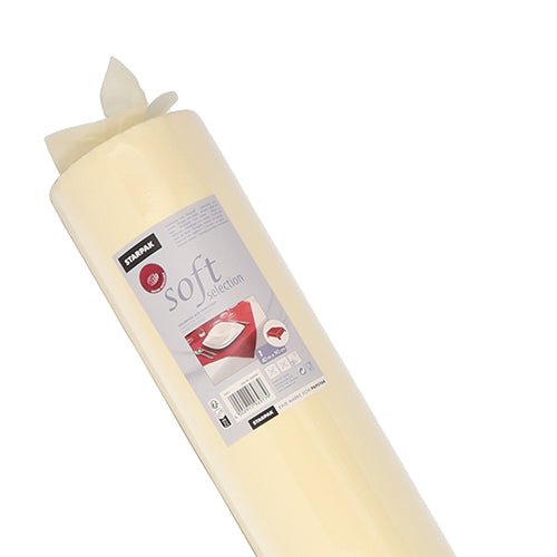 A partially unrolled roll of Starpak tablecloth, fabric-like, fleece "Soft Selection" from Starpak, in off-white, with visible product label and usage instructions on the packaging.