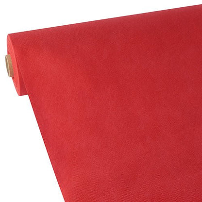 A large roll of Starpak tablecloth, fabric-like, fleece "Soft Selection" from Starpak is partially rolled out on a plain white background, highlighting the uniform color and fabric-like texture.