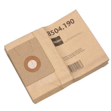 Pictured is a stack of double filter paper bag dorsalino vacuum bags (cardboard, 10 packs) for TASKI dorsalino from Diversey Deutschland GmbH & Co. OHG; a bag has a cardboard collar with a round opening and the product number 8504.190.