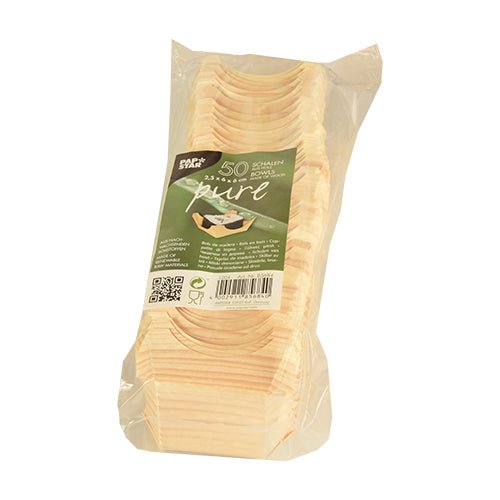 A transparent plastic packaging from PAPSTAR GmbH contains 50 round finger food bowls made of wood of the "pure" brand, provided with a green-white label with product details and barcode. The bowls are elegant and environmentally friendly.