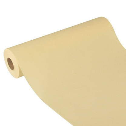 The Starpak table runner, fabric-like, fleece 'Soft Selection Plus' (24 m x 40 cm) in light beige lies partially unrolled on a white background, highlighting its smooth texture and elegant appearance - ideal for special occasions.
