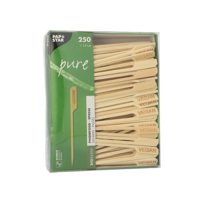 A pack of 250 PAPSTAR 12 cm finger food skewers "pure" by PAPSTAR GmbH, vegan and ideal for party buffets. The mostly green box with white and wood tones shows the skewers through the clear packaging.