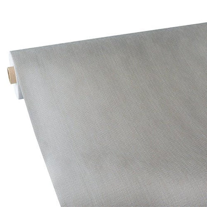 A partially unrolled Starpak tablecloth, fabric-like, fleece "soft selection plus" displays its smooth, flexible light gray surface with even coloring; it features a cardboard core and is manufactured by Starpak.