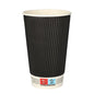 A black Starpak 25 drinking cup “To Go” Ripple Wall paper cup with a white interior and white bottom, printed with symbols and warnings on the bottom, is depicted against a plain white background.