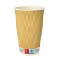 A single PAPSTAR 25 drinking cup, paper "To Go" Ripple Wall from PAPSTAR GmbH: disposable cup with ribbed light brown exterior, white interior, and multilingual warning symbols and text on the bottom.