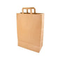 A PAPSTAR 50 carrier bag, paper with handle from PAPSTAR GmbH stands upright on a white background. The eco-friendly, unused bag has a flat bottom and two rectangular handles.
