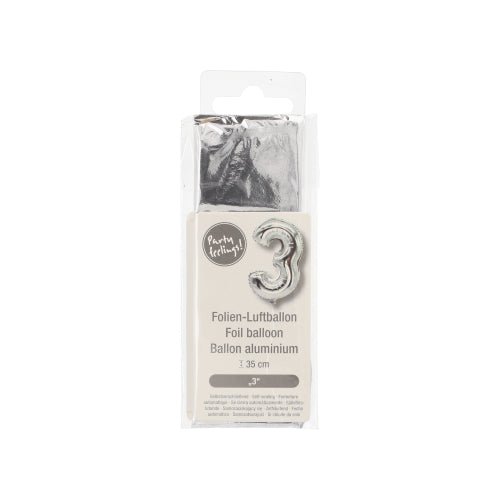The foil balloon from PAPSTAR GmbH measuring 35 x 20 cm in the color silver is packaged in a clear film and provided with a beige label showing product details and decorations in German, English, and French.