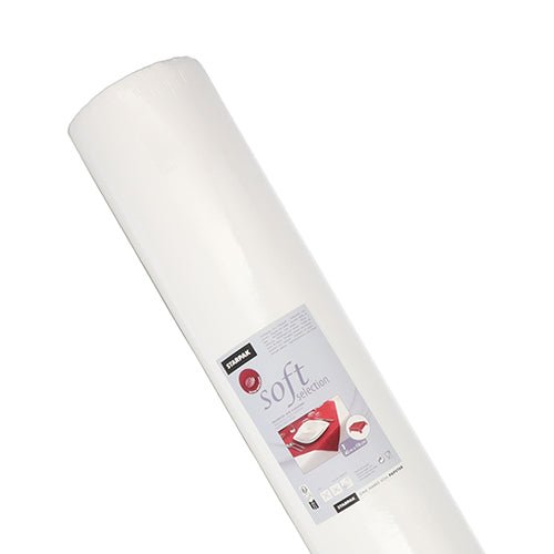A large white Starpak tablecloth, fabric-like fleece "Soft Selection" (40 m x 1.18 m), is shown upright with a label featuring dinner plates, indicating it as ideal for use in the catering industry.