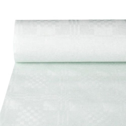 A partially unrolled PAPSTAR paper tablecloth with damask embossing in elegant white lies on the table and shows the subtle, geometric pattern of this festive premium tablecloth from PAPSTAR GmbH.