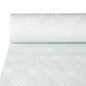 A partially unrolled PAPSTAR paper tablecloth with damask embossing in elegant white lies on the table and shows the subtle, geometric pattern of this festive premium tablecloth from PAPSTAR GmbH.