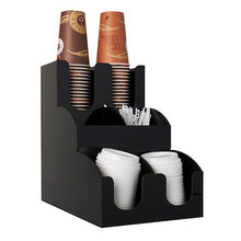 The Starpak "To Go" Cup and Lid Dispenser (2 boxes) is a black countertop organizer that holds brown paper cups, white plastic lids, and coffee stirrers in separate compartments.
