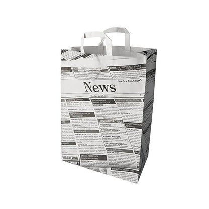 The PAPSTAR 50 carrier bags of PAPSTAR GmbH are paper carrier bags with handles, featuring a black-and-white newspaper print and the inscription "News" at the top - ideal as an eco-friendly carrier bag for stylish, eco-friendly transport.