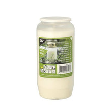 The PAPSTAR oil light T6 (Ø 7 cm, white) contains 100% vegetable fat in a transparent plastic container with a lid. The label includes product information, safety symbols, and a green outdoor scene - ideal for eco-friendly lighting.