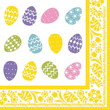 The PAPSTAR napkins "Colorful Eggs" (40x40 cm, 1/4 fold, 50 pieces) from PAPSTAR GmbH feature twelve colorful Easter eggs with various patterns on a white background and a yellow floral border.
