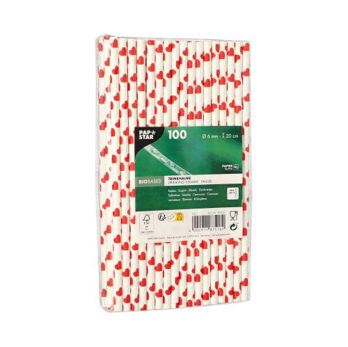A pack of 100 PAPSTAR straws, paper Ø 6 mm from PAPSTAR GmbH with a red heart pattern, individually wrapped in plastic. The green label contains information about the brand, the eco-friendly bio-based material, and the size.