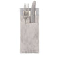 A silver fork and knife rest in a PAPSTAR 520 cutlery bag (20x8.5cm, 2-ply) with an integrated matching napkin from PAPSTAR GmbH, handles protrude and the napkin is partially visible behind.