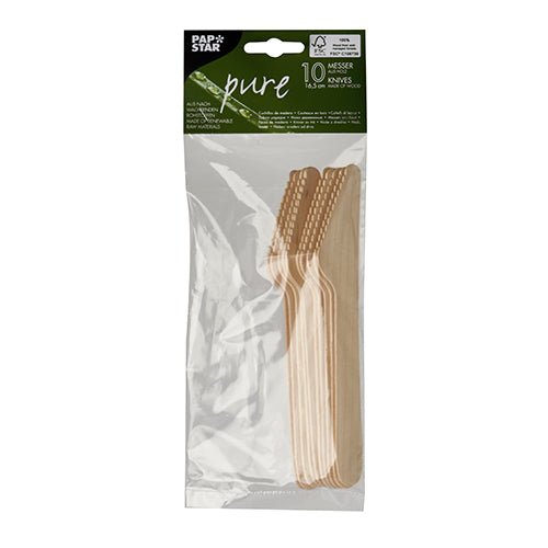 Ten PAPSTAR 10 knives, wood "pure" knives from PAPSTAR GmbH are neatly stacked in a transparent plastic packaging and labeled with a green-white sticker containing brand and product information. The knives are made of biodegradable wood.