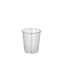 A transparent shot glass from PAPSTAR GmbH, made from crystal-clear PS and PLA "pure", is shown empty on a white background. The cup is one of 40 from the PAPSTAR 40 glasses for shot set and features subtle grooves at the bottom area.