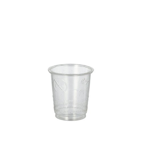 A transparent shot glass from PAPSTAR GmbH, made from crystal-clear PS and PLA "pure", is shown empty on a white background. The cup is one of 40 from the PAPSTAR 40 glasses for shot set and features subtle grooves at the bottom area.