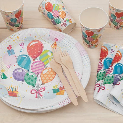 PAPSTAR 10 cardboard drinking cups (0.2 L, Ø 7 cm · 9.7 cm) from PAPSTAR GmbH are presented with matching plates, napkins, and wooden cutlery on light wood. This cheerful balloon and confetti tableware is perfect for birthday parties.