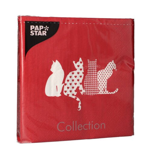 The PAPSTAR 20 napkins (33x33 cm, 3-ply, red) from PAPSTAR GmbH feature four white cat silhouettes in various designs, adding a playful accent to the set table.