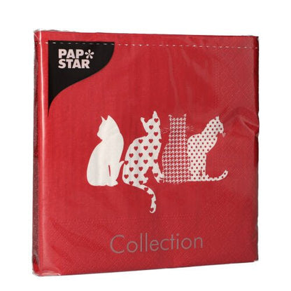 The PAPSTAR 20 napkins (33x33 cm, 3-ply, red) from PAPSTAR GmbH feature four white cat silhouettes in various designs, adding a playful accent to the set table.