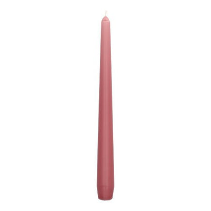 A single, unlit Starpak taper candle (Ø 2.2 cm - 25 cm) in bright pink stands upright against a plain white background.