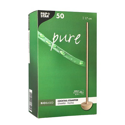 A green box PAPSTAR 50 cocktail muddlers "pure" 17 cm natural from PAPSTAR GmbH shows a wooden stamp on the front. The bio-based packaging contains 50 wooden pieces, each 17 cm long.