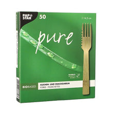 A green PAPSTAR pure box contains 50 eco-friendly, bio-based bamboo snack forks (14.5 cm, serrated) from PAPSTAR GmbH. The front shows a fork, a bamboo leaf with droplets, and is labeled with German, French, and English text.