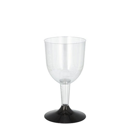 The Starpak 20 white wine stemmed glasses, made of clear polystyrene with a black stem and base, are perfect for serving white wine or other beverages in stemmed glasses for any occasion.