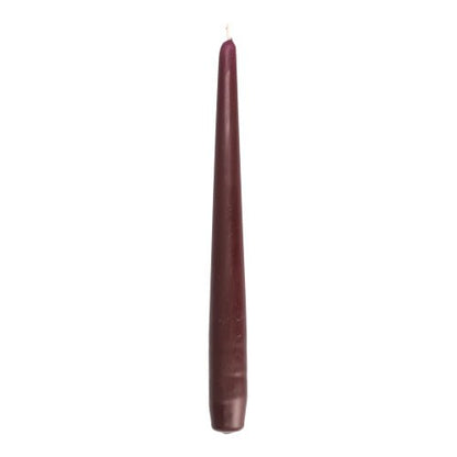 A single, unlit, dark purple Starpak taper candle (Ø 2.2 cm - 25 cm) stands upright against a white background - a bold contrast to classic white candles. Made from high-quality paraffin for a smooth surface.