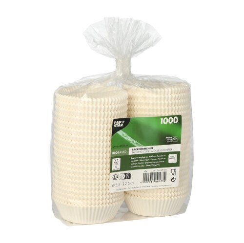 In a transparent plastic bag, there are 1,000 PAPSTAR 1000 baking cups round of PAPSTAR GmbH, with a green label with product details and certifications.