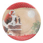 The PAPSTAR 10 plates, round cardboard Ø 23 cm from PAPSTAR GmbH shows Santa Claus on a snowy roof with a candy cane, full moon, and snowflakes – ideal for festive parties and events.