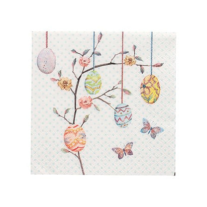 A blooming branch shows five decorated Easter eggs on strings, next to two butterflies. The white background with light blue dots is ideal for the PAPSTAR 20 napkins, 25 cm x 25 cm, 3-ply from PAPSTAR GmbH.