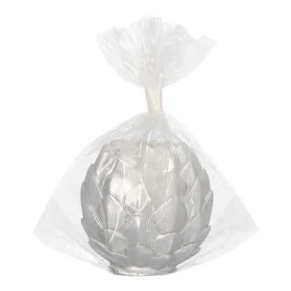 The Starpak ball candle Ø 10 cm silver "Pine Cone" comes packaged in clear plastic wrap, has a gathered top, and features a festive pine cone design - ideal as a decorative accent.