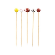 The finger food picks "Sport" (12.5 cm, pack of 40) from PAPSTAR GmbH are perfect for party snacks. They are each equipped with a sports ball (tennis, baseball, American football, soccer, basketball) and arranged in a straight line on a white background.