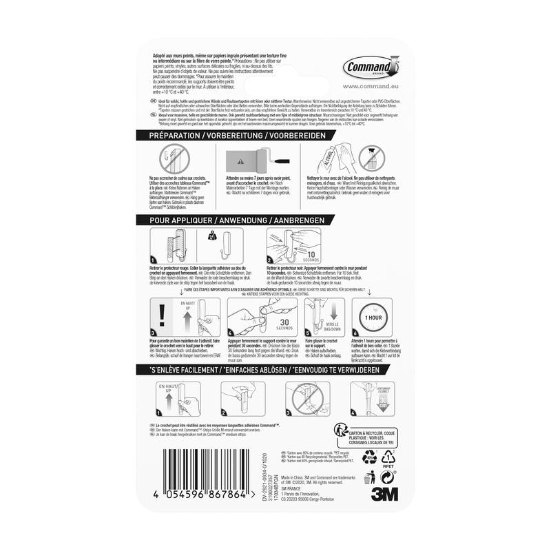 Back of the 3M Deutschland GmbH Medium-sized Command™ matte black hook, 17034B, shows multilingual instructions with diagrams for application and removal, step symbols, and a barcode; includes 1 hook and 2 strips.