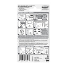 On the back of the Command™ Picture Hanging Strips S, small, black, 17202BLK from 3M Deutschland GmbH, you will find a pictorial step-by-step guide for attaching and removing, weight limits, and multilingual product information for easy hanging of pictures without nails.
