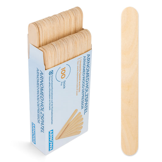 An opened box of ARNOMED WOODEN SPATULA Unsterile natural by ARNOWA GmbH reveals numerous wooden spatulas; next to it lies a single disposable wooden spatula - perfect for practice needs.