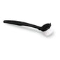 The Nölle Profi-Brush Dish Brush round, large has a black handle made of environmentally friendly regranulate with indented handles and outwardly angled white bristles. Pictured on a solid white background. 1 piece. Brand: Nölle Profi Brush Brush & Brush Technology e.K.