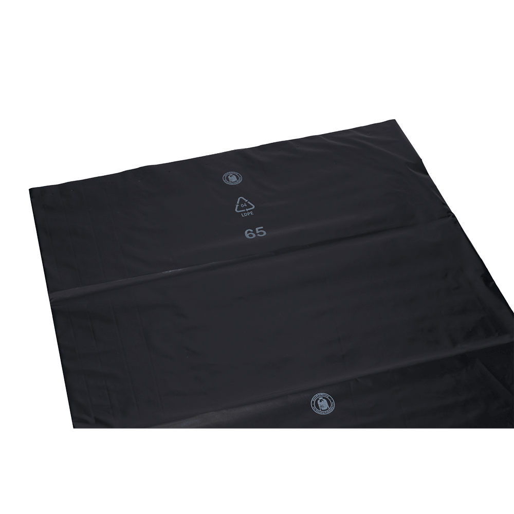 A large, flat DEISS 95007 black garbage bag sheet from EMIL DEISS KG (570+400x1150x0.1 mm) shows recycling and plastic ID symbols with the number 65 in white - ideal for waste disposal on a plain white background. The box contains 120 bags.